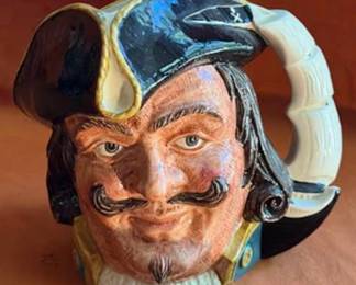 Royal Doulton character jug depicting Capt Henry Morgan, model D6467. Ceramic with detailed hand-painted features and decorative handle. Marked on the base with model and registration numbers.
