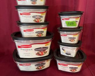 Rubbermaid Premier food storage containers with black lids. Various sizes included, all labeled as BPA-free and stain resistant.