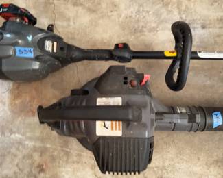 One Craftsman gas-powered leaf blower and one Craftsman gas-powered string trimmer. Both tools have visible wear and some dirt present. Functionality not tested. Red and black