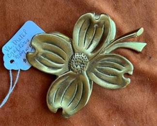 Virginia Metalcrafters solid brass dishes in leaf and flower forms. Includes three hydrangea leaf dishes, three dogwood leaf dishes, and one dogwood flower. Maker's mark on each piece. Suitable as decorative or catchall dishes.