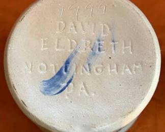 Blue decorated and glazed stoneware pottery, including signed pieces by David Eldreth of Nottingham, PA, bowls, crocks, a pitcher, decorated heart and flower motifs, and a dog dish. Some pieces are dated 1993 and 1999.