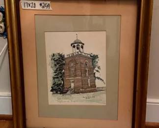 Two framed art prints: one titled 'Bell Tower, Williamsburg, Virginia' by Mary Jane Thomas Stokes, dated 1979, in a 17x20 inch frame; and an architectural scene signed 'Claude Duval' in a 17x21 inch frame.
