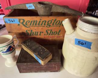 Remington Shur Shot wood crate, ceramic jug with spout, Robert E. Lee Virginia souvenir cup, metal box marked "Old Briar," and a box of dice. Items show signs of age and handling.