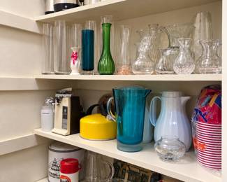 Wonderful assortment of vintage kitchenware and glassware, including stainless-steel coffee and beverage servers, colorful pitchers, glass carafes, vases, crystal pieces, serving bowls, small appliances, vintage containers, and more. A great selection for collectors, entertaining, or everyday use!