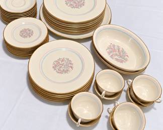 Elegant vintage china dinnerware set featuring an ivory finish, delicate pink and blue floral designs, and gold-trimmed edges. The collection includes dinner plates, salad and dessert plates, saucers, cups, serving platters, and oval serving bowls. A beautiful set for entertaining, holiday meals, or collectors! Franciscan Fine China "Rossmore"