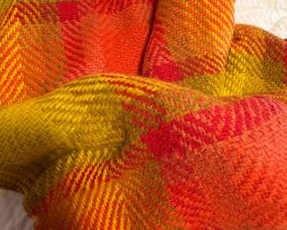 UO home orange and mustard throw $25