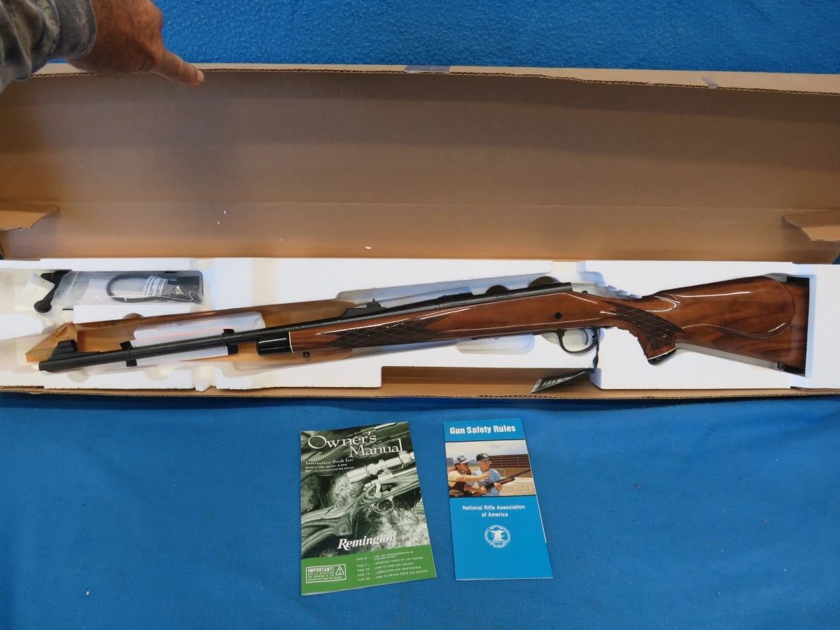 Lot 11. Remington Model 700 30-06 bolt-action rifle. S/N G7074445. Won at a banquet and except for photos has never been out of the box. Includes original box.