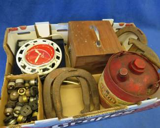 Lot 338. Vintage gas can, a clock for parts or repair, and more