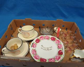 Lot 53. Decorative plates, small glass set, and more