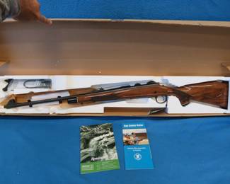 Lot 11. Remington Model 700 30-06 bolt-action rifle. S/N G7074445. Won at a banquet and except for photos has never been out of the box. Includes original box.