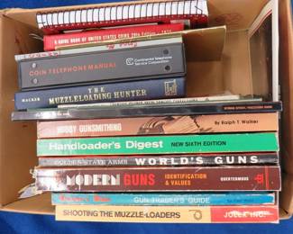 Lot 318. Mostly hunting and gun books, with a couple of old coin value books