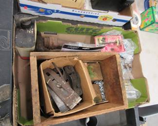 Lot 172. Garage Goodies including a vintage Mobile Oil can with a spout, wood plane blades, an old air pump, Garage Goodies including a vintage Mobile Oil can with a spout, wood plane blades, an old air pump, hinges, and more.