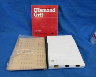 Lot 155. Sand paper as described or shown in the photos