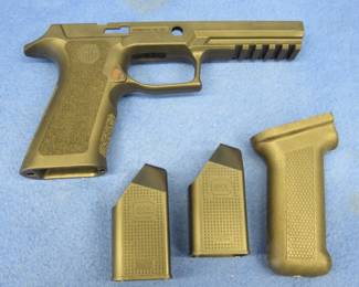 Lot 48. SIG Sauer P320 frame, two Glock magazine loaders, and more. Buyer paperwork and permit are necessary