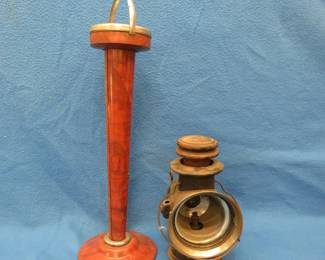 Lot 91. Vintage metal ashtray and a Dietz lantern missing the front glass