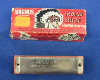 Lot 164. Magnus 10-hole diatonic harmonica with part of the box and papers. Sounds great.