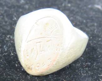 Lot 244. Size 12 ring marked on the front of the ring 1943