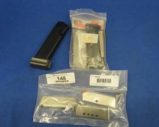 Lot 236. Five pistol magazines; one for a Canik TP series, one PROSIG13 9mm, and three unknown
