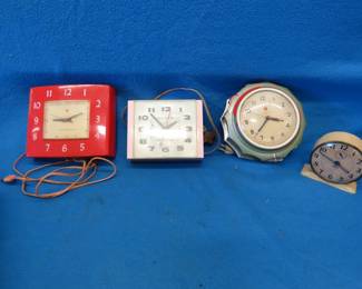 Lot 339. Three working General Electric MCM kitchen clocks and a non-working wind-up clock