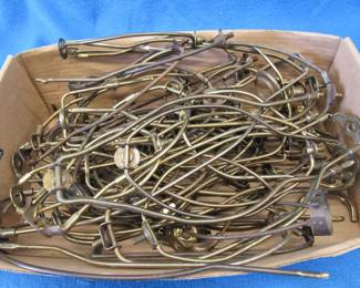 Lot 147. Many lamp harps