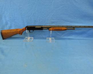 Lot 15. Mossberg 500E 410 gauge pump shotgun. S/N L918468. 24" vent rib barrel with a 3" chamber. Drilled for a scope. Very good condition. Includes a case.