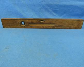 Lot 13. Antique 26 inches Stanley #96 rosewood level. Both vials intact. Missing one vertical vial ring. All other brass is intact.