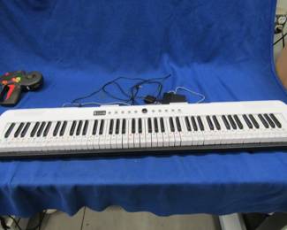 Lot 206. 88-key electric piano key board. Works great.