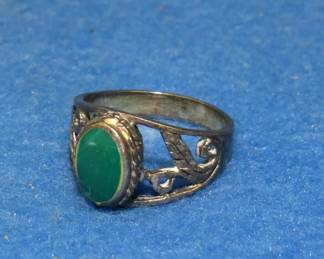 Lot 243. Size 7 Jade? ring marked 925