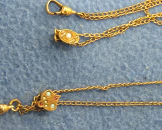 Lot 59. Two Lorgnette watch chains with slider charm