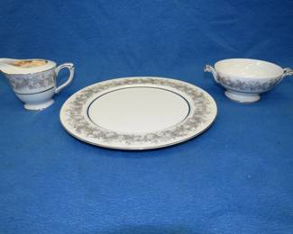 Lot 404. Sango Florentine china. See the consignor's manifest sheet for inventory. AAA did not empty the box or confirm the inventory. The china appears to be very well wrapped.