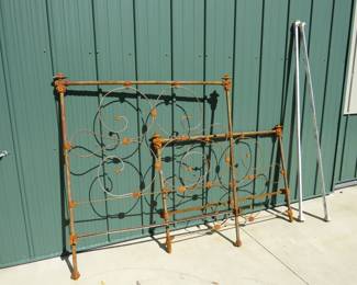 Lot 388. Antique iron bed frame and rails