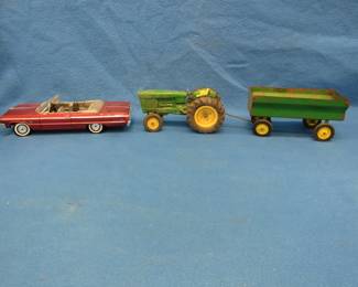 Lot 45. Die-cast 1964 Chevy SS Impala and a John Deere tractor and wagon