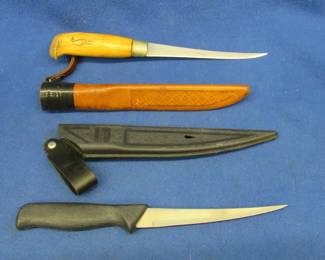 Lot 203. Two very sharp fillet knives and sheathes
