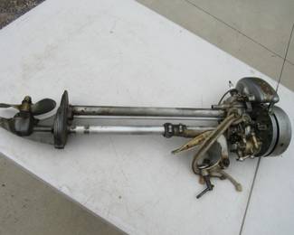 Lot 103. Old Evinrude Elto outboard motor.