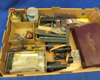 Lot 303. Strait razor boxes, polished rocks, binoculars, and more