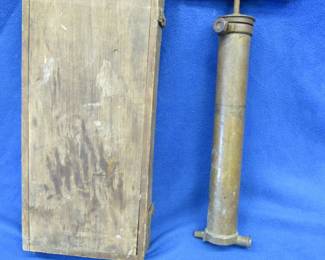 Lot 157. Old brass air pump and a wooden, hinged box