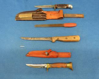 Lot 115. Three fixed blade knives including a Western