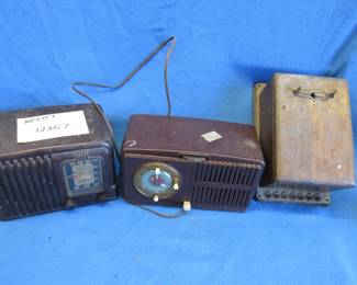 Lot 381. Two non-working tube radios and a wooden housing for a telephone