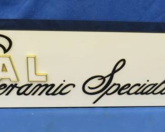 Lot 88. Oral Specialties LTD. lighted sign. Appears to be Fluorescent light that may need new bulbs or a starter; did not turn on 49x12x4 1/4 inches