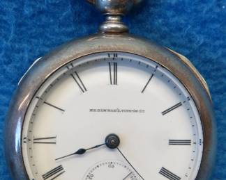 Lot 327. Elgin key-wind pocket watch with a very thick crystal. Elgin movement #1542473. Newport Coin case #687792. Not working.