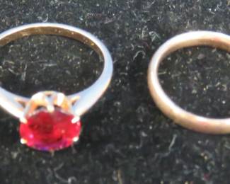 Lot 245. Two rings: one is size 5 and has been resized; the other is described by seller as 14k ruby