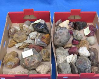 Lot 237. Two flats of interesting rocks and a mineral book. Please see Auctioneer's Notes at the start of this auction.