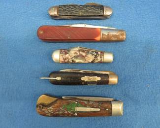 Lot 33. Five folding knives including a Remington for parts