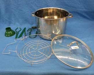 Lot 35. Water bath canner with accessories. Appears to be unused.