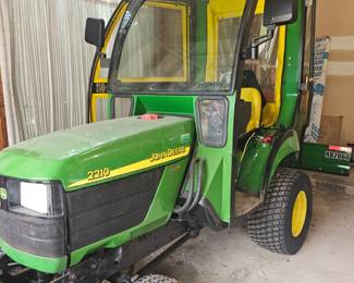 AVAILABLE FOR PRESALE  John Deere 2210 HST 4WD Compact Utility Tractor Package This well-maintained John Deere tractor shows approximately 383 hours and includes everything needed to tackle Michigan winters and year-round property maintenance. Package includes: • John Deere 2210 HST 4WD compact tractor • Curtis enclosed cab with doors and mirrors • Cab heater/defroster • John Deere front-mounted snowblower • Frontier RB2060 60-inch rear blade • Good tires and clean, complete interior Presale Price: $12,500 or best reasonable offer