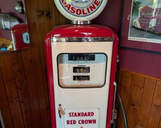 Red Crown Tokheim pump with wine rack inside