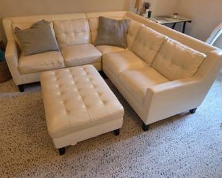Cream Leather Sectional Sofa with Matching Tufted Ottoman