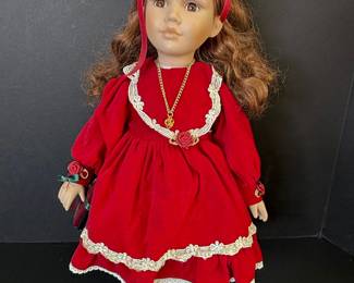 Collector's Choice Porcelain Doll in Red Velvet Dress