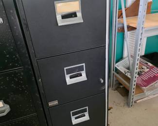 4-drawer vertical fireproof file cabinet by the brand Victor, with keys!