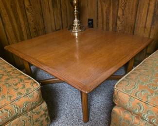 Lane, modern square wooden coffee table featuring a warm wood grain top and tapered legs. Style # 0907-17